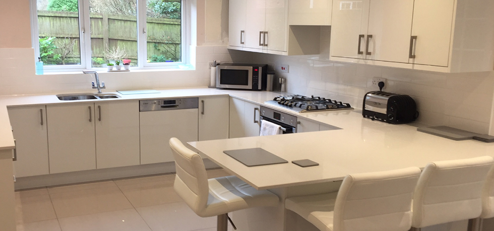 Premier Kitchen Doors installation displaying M-Stone White Gem Stone. 